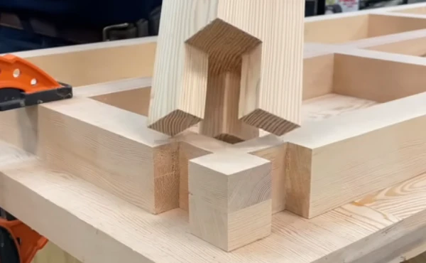 Two perfectly cut timber pieces with clean edges, ready to be joined together, illustrating precision and craftsmanship in woodworking.